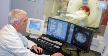 MRI technologist monitoring the screen